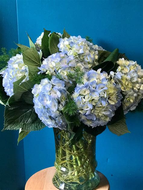 Magical candle adorned with hydrangea